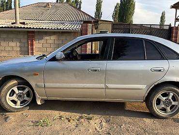 карбиратор 2106: Mazda 626: 2001 г., 2 л, Механика, Бензин, Хэтчбэк — 3