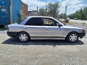 Mazda: Mazda 323: 1990 г., 1.6 л, Механика, Бензин, Седан