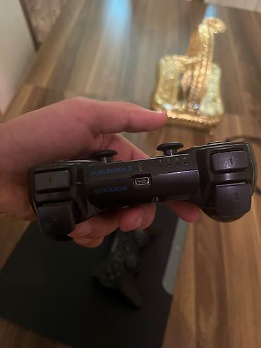 quest 3: Sony PlayStation 3 Slim oyun konsolu Xüsusiyyətlər: - PS3 Slim korpus — 1