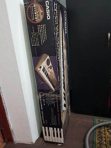 cd disk: Синтезатор Casio AT-5 Oriental Keyboard - Клавиатура: 61 — 2
