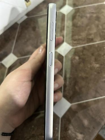 ipad 10.2 qiymeti: Samsung Galaxy A14, rəng - Gümüşü, Barmaq izi — 2