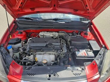 kia salon: Kia Rio: 1.4 l | 2010 il Sedan
