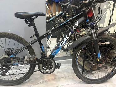 Велосипеды: Продам велосипед в отличном состоянии размер колёс 24 сделан из