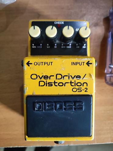 işlənmiş gitara: Məhsul: BOSS OS-2 OverDrive/Distortion gitara pedalı Xüsusiyyətlər: - — 1
