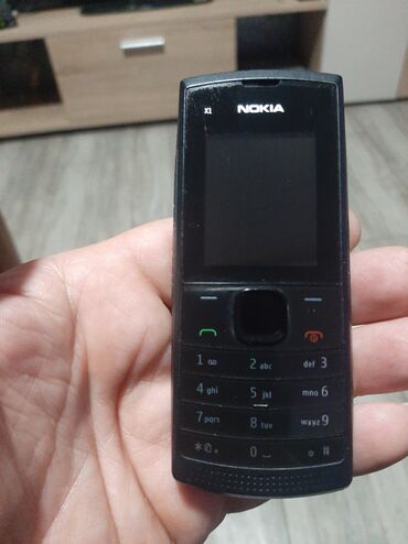 Nokia: Nokija x1 sa dve kartice kao nova radi na sve mreze,baterija — 5
