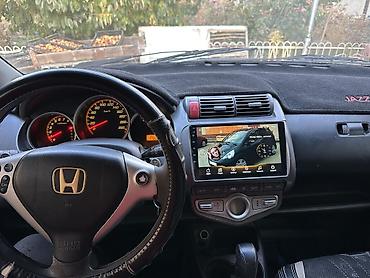 газ уста: Honda Jazz: 2005 г., 1.3 л, Автомат, Бензин, Хетчбек — 6