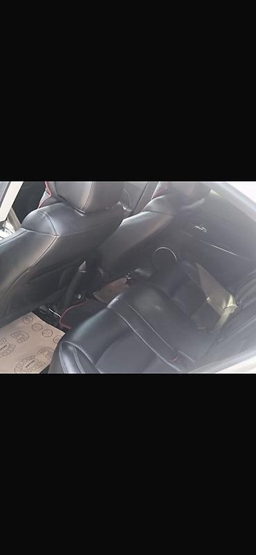 opel astra k: Chevrolet Cruze sedan – ağ rəng, 5 yerlik, ön çəkişli. Texniki və — 2