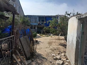 savalanda torpaq: Torpaqda köhnə tikili kürsülü ev var ancaq qiymətə daxil deyil. Torpaq — 8