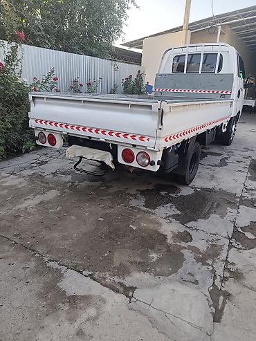 мини борт: Kia Bongo III, бортовой малотоннажный грузовик - Компоновка: кабина — 6