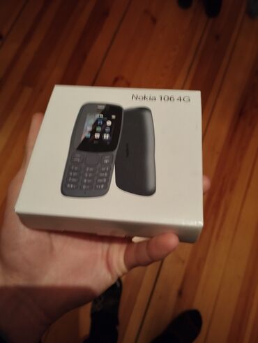 nokia 6220: Nokia 106, цвет - Черный, Кнопочный, Две SIM карты
