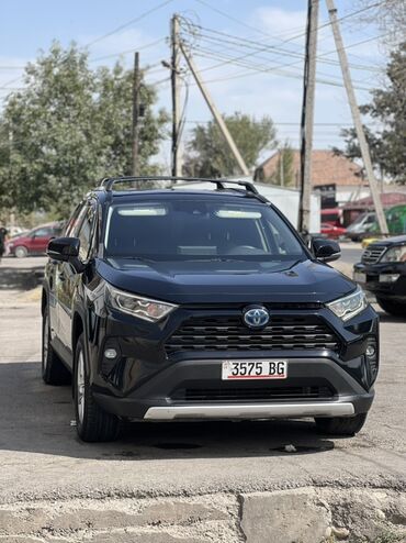 тайоты: Toyota RAV4, чёрный кроссовер. Кузов и экстерьер: - Черный металлик
