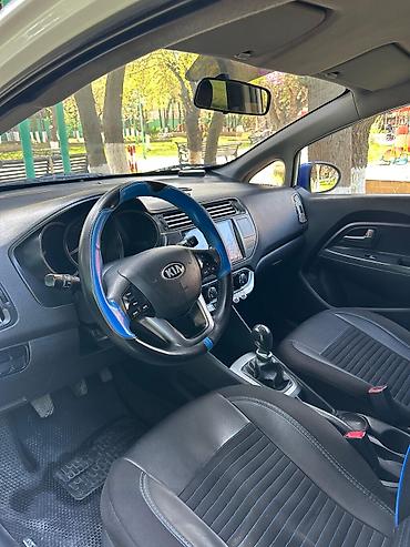 opel duman: Kia Rio: 1.4 l | 2013 il Sedan — 8