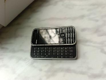 sumqayit telefonlar: Nokia 5730 Xpressmusic, rəng - Qara, Düyməli — 1
