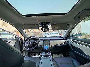 Другие автомобили: Электромобиль (седан) с современным интерьером и панорамной крышей — 2