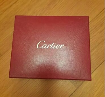 toy çantası: Cartier portmane 150 manata alinib yenidir