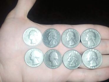 2 dollar nece manatdir: 8 ədəd Liberty (Quarter dollar).Ümumi 10 Manat