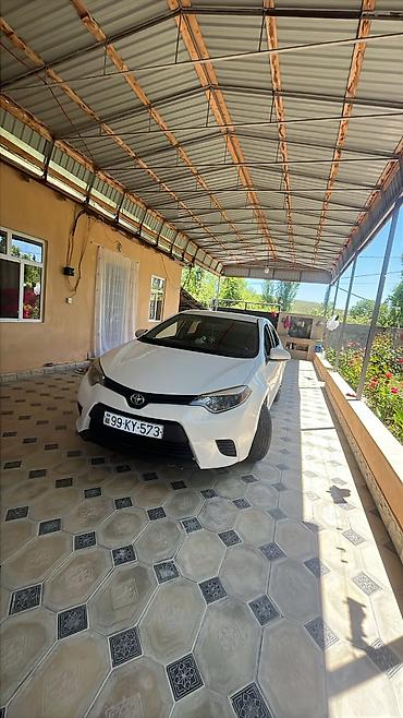 Toyota Corolla, ağ rəng,sedan gövdə. I - Nömrə nişanı: 99-KY-573 lalafo.az -da Toyota Corolla, ağ rəng,sedan gövdə. I - Nömrə nişanı: 99-KY-573