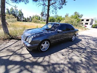 opel astra amartizator: Mercedes-Benz E-Class: 2.4 l | 1998 il Sedan — 1