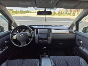 Коммерческий транспорт: Nissan Tiida modeli qara rəngdə, heç bir cızığı olmayan, həm şəhər