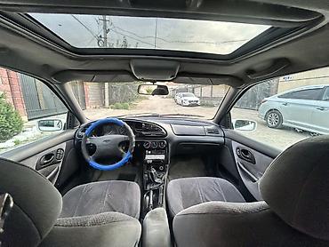 эо 3323: Ford Mondeo: 1997 г., 1.6 л, Механика, Газ, Седан — 4