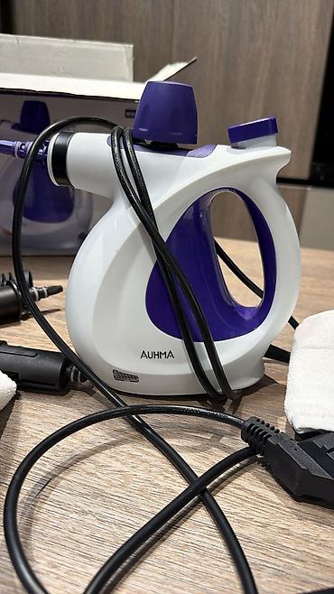 Tozsoranlar: AUHMA WHL-603 buxarlı təmizləyici Xüsusiyyətlər: - Güc: 1050W — 3