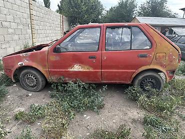 кызыл кия кыз: Nissan Март: 1992 г., Хетчбек — 2