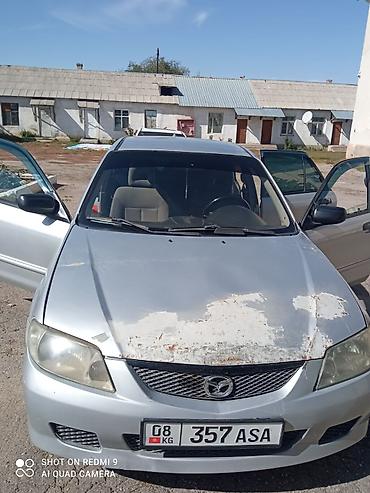 Mazda: Mazda 323: 2002 г., 1.6 л, Механика, Бензин, Хэтчбэк — 4