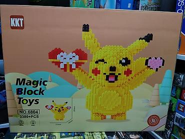 Игрушки: Конструктор Magic Block Toys KKT NO.6804 — фигурка жёлтого персонажа в — 1