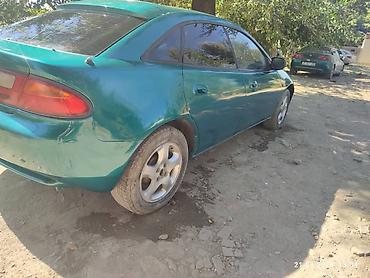 зарядка электровелосипеда: Mazda 323: 1996 г., 1.8 л, Механика, Бензин, Седан — 3