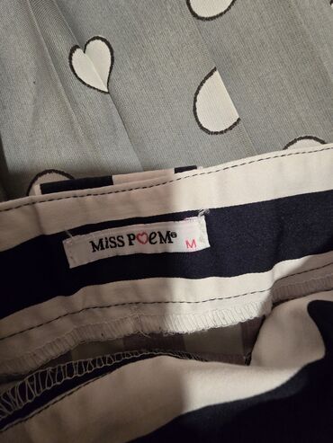 Qadın şalvarları: Bu dəstə müxtəlif üslublu dörd qadın şalvarı və bir qara ətək — 22