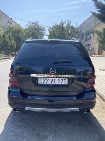 Mercedes-Benz: Mercedes-Benz ML (W164) – qara rəngli, 5 qapılı premium SUV. Xarici — 21