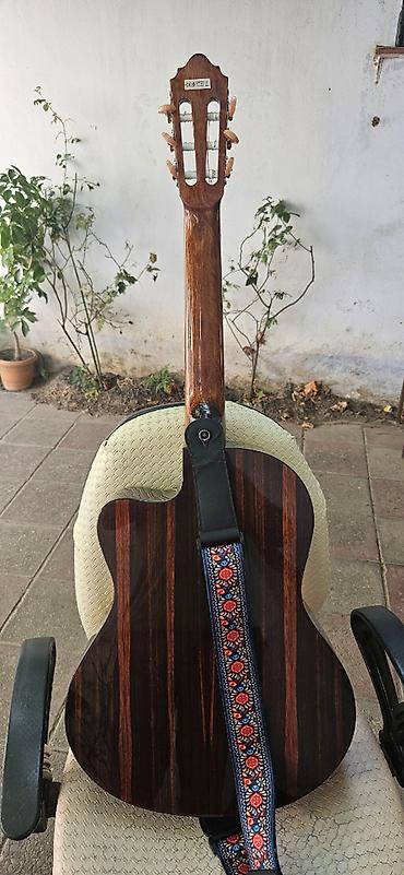 Gitaralar: Akustik gitara, 6 sim, İşlənmiş, Ünvandan götürmə — 2