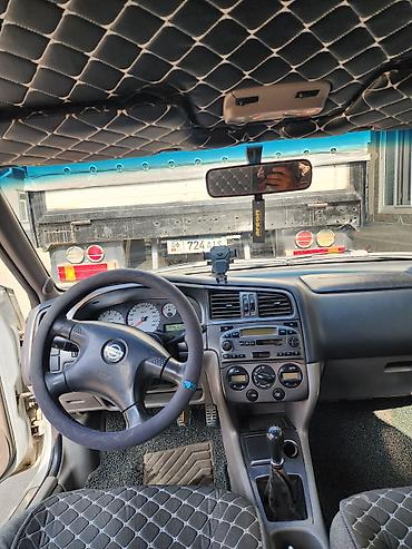 граната на ипсум: Nissan Primera: 2001 г., 1.8 л, Механика, Бензин, Седан — 4