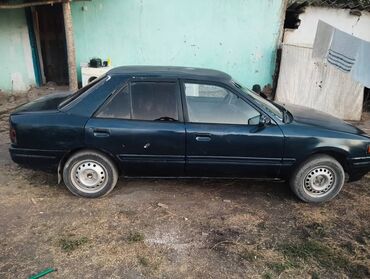 кузов реф: Mazda 323: 1990 г., 1.5 л, Механика, Бензин