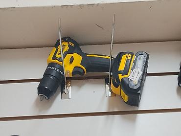 бор машинки: Аккумуляторная дрель-шуруповерт DeWalt 18V - Компактная — 1