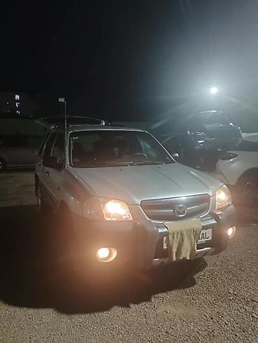kia s: Mazda Tribute: 2003 г., 2 л, Механика, Бензин, Кроссовер — 1