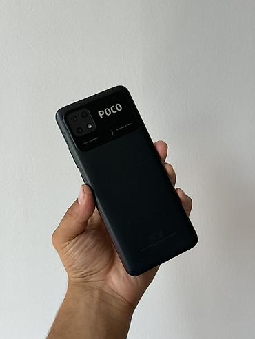 Уюлдук телефондор жана аксессуарлар: Poco C40, Колдонулган, 64 ГБ, түсү - Кара, 2 SIM — 1