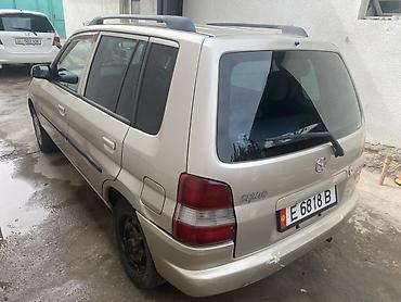 10 лет в одних руках: Mazda Demio: 1999 г., 1.3 л, Автомат, Бензин, Хэтчбэк — 5