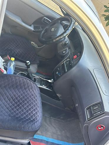 rota grid: Hyundai Elantra: 2004 г., 1.6 л, Механика, Бензин, Седан — 5