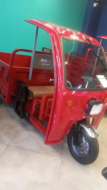 kamaz bortu: Elektrik yüklü üçtəkərli nəqliyyat vasitəsi – qapalı kabinali model - — 1