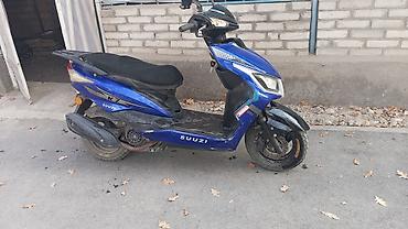 Скутеры: Скутер SUUZI K7 (синего цвета) Описание: - Компактный городской — 1