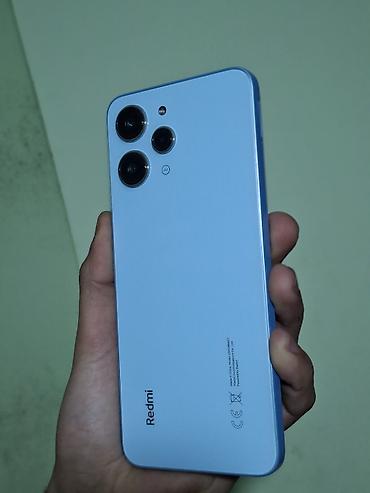 Redmi: Məhsul: Redmi smartfon - Rəng: Açıq mavi - Korpus: Düz (flat) kənarlı — 2