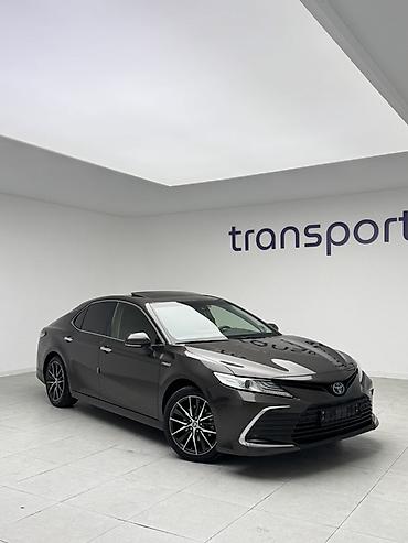 byd e2 2024: Toyota Camry: 2022 г., 2.5 л, Автомат, Гибрид, Седан — 2