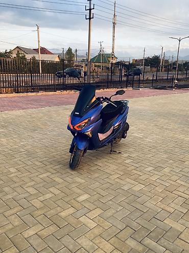 t max: Скутер/максискутер 150–200 см³ класса (визуально — форм‑фактор Yamaha — 4