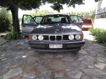 BMW 518: 1.8 l | 1992 year Limousine
