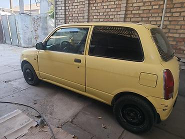 авто ижара: Daihatsu Cuore: 2001 г., 0.7 л, Кол менен иштөөчү, Бензин, Хетчбек — 2