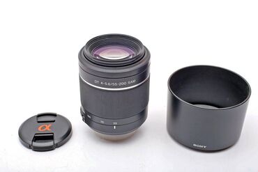 sony lens: Sony 55-200mm f/4-5.6 SAM DT Telephoto Zoom Lens. İdeal vəziyətdədir