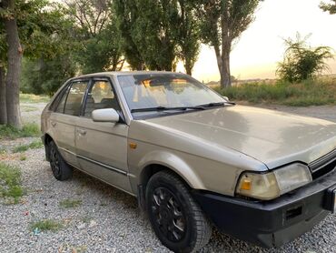 мазда демйо: Mazda 323: 1989 г., 1.3 л, Механика, Бензин, Хетчбек