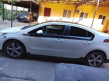 byd e2 2024: Chevrolet Volt: 2012 г., Вариатор, Гибрид, Хэтчбэк — 4