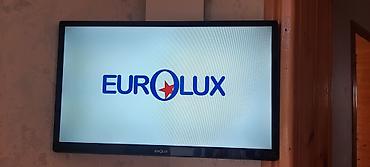 philips xenium x525: Eurolux televizor - Ekran: təxminən 32" ölçülü düz panel - Korpusu — 1